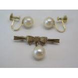 A pair of 9ct gold screw back pearl earrings and a pearl brooch, total weight approx 4.4 grams, some