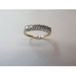 A 9ct yellow gold seven stone diamond ring, approx 0.5ct, weight approx 2.7 grams, size P