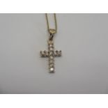 A 9ct yellow gold diamond cross pendant, approx 0.5ct - on a 9ct chain, weight approx 4.3 grams