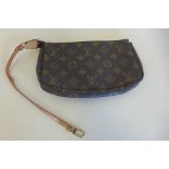 A Louis Vuitton monogram interior pouch, 23x15cm, with strap and clip, some usage, strap is