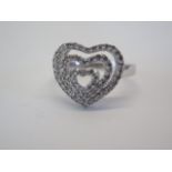 A 9ct hallmarked white gold heart diamond ring, approx 0.5ct - weight approx 3.8 grams, as new -