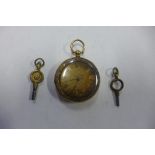 An Edwardian 18ct gold ladies fob watch with engraved foliate decoration to the case and bezel,