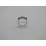 A 9ct hallmarked white gold multi-gem set ring, size N, approx 2 grams, in good condition