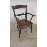 A Victorian ash and elm open armchair