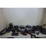 Ten 35mm cameras including an Olympus Trip 35 with snakeskin effect, Canon, Pentax, Zenit,
