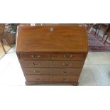 A Georgian mahogany bureau with two short over three long drawers, with good colour and good