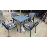 A new boxed Kettler table and four aluminium chairs with covers, table size 100cm x 100cm, can be