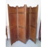 A hard wood four panel full height folding screen, 187cm tall, 180cm wide