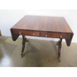 A 19th century rosewood brass inlaid drop leaf sofa table, with two drawers on splayed reeded