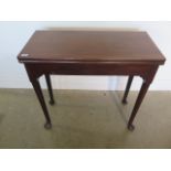 A Georgian mahogany fold over tea table - 73cm tall x 81cm wide