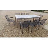 A Bramblecrest teak table, measuring 220cm x 100cm, and a set of eight aluminium mesh armchairs