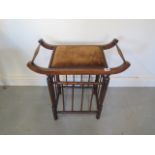 A late Victorian Liberty style music stool 59cm tall x 57cm x 30cm