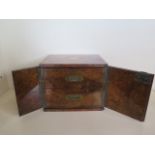 A good quality late Victorian/Edwardian walnut humidor with two internal drawers and a Bramah lock -