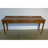 An oak serving table on turned legs, 200cm wide x 84cm high