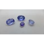 Four loose blue sapphires, largest approx 9.5mm a 6mm x 5.8mm, no gem report