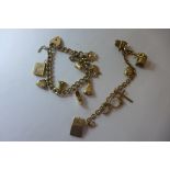Two 9ct yellow gold charm bracelets, total weight approx 50 grams