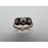 A 10ct gold amethyst and pearl ring, size R, weight approx 2.2 grams - stamped 10k, condition - some