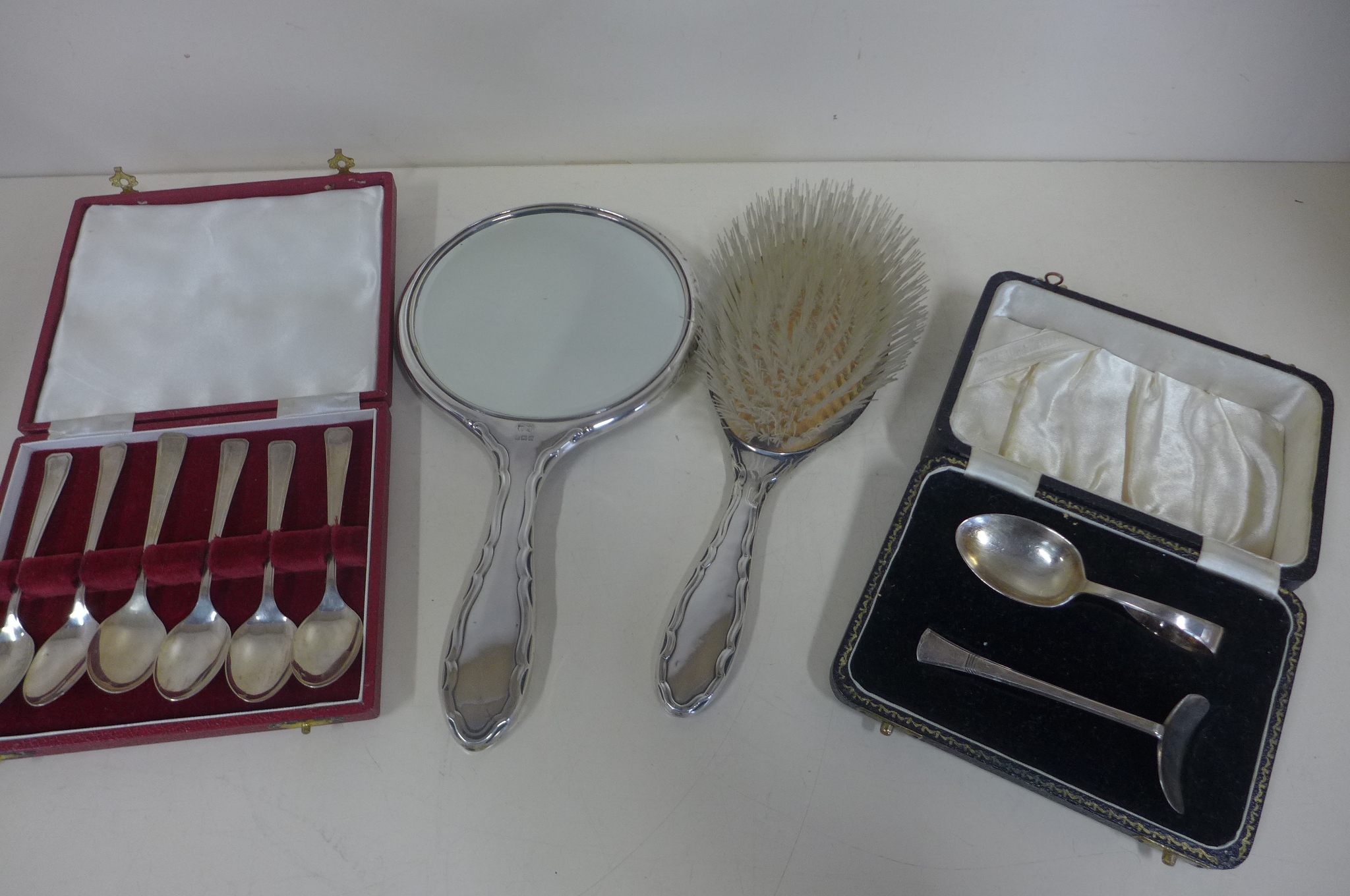 A boxed set of silver teaspoons, a silver spoon and pusher and a silver backed brush and mirror - - Image 2 of 2