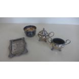 Two silver cruet pieces, a silver bowel and a silver punch pin tray, total weight approx 5 troy oz