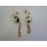 A pair of 9ct drop earrings, set with Murano style glass hearts, above gold tassells, in good
