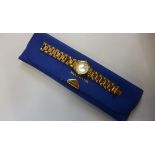 A Radius quartz bracelet watch with pouch, generally good, running
