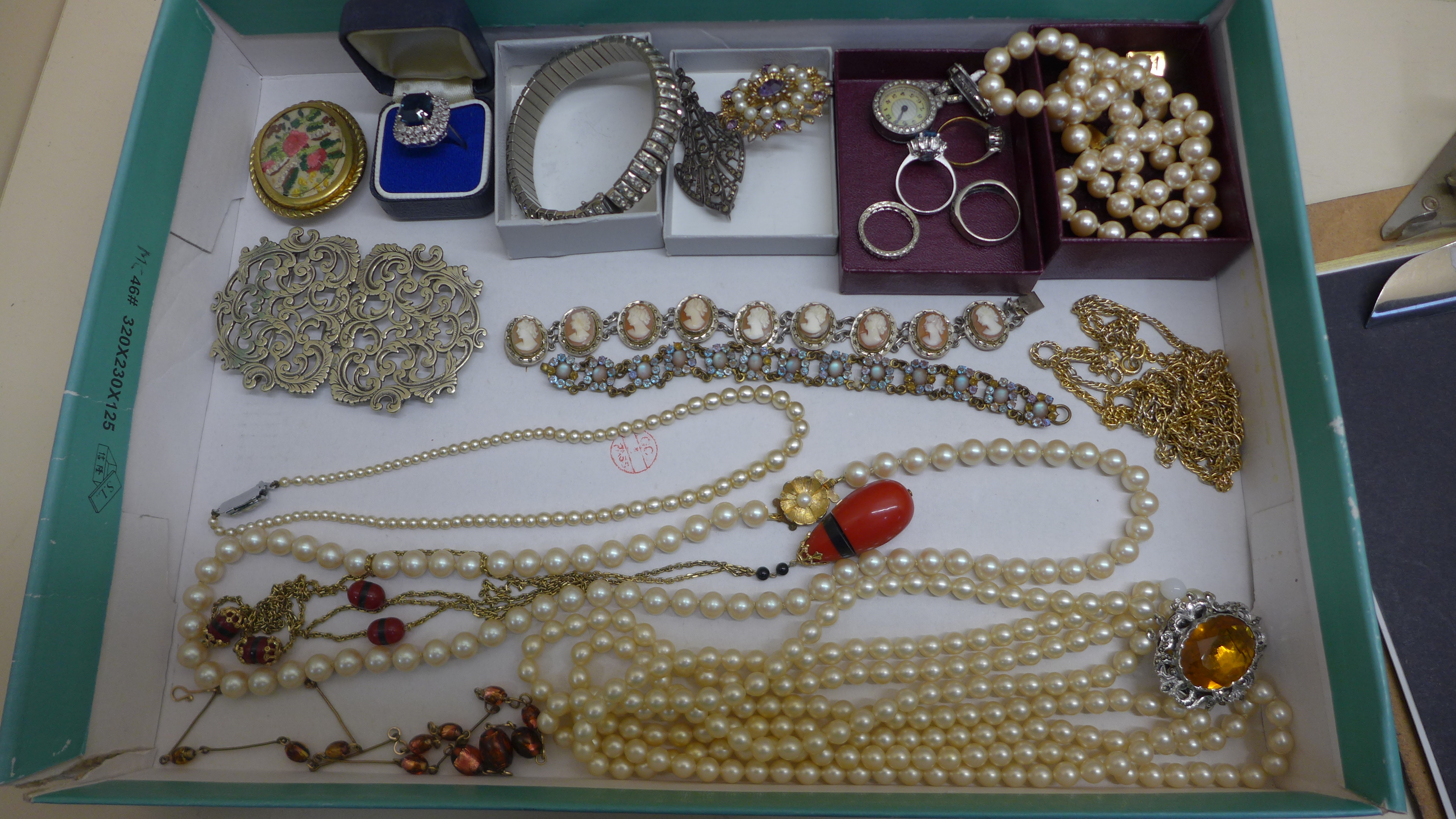 A collection of vintage costume and silver jewellery to include rings, necklaces, nurses buckle etc