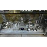 A collection of silver plated ware including pair for candlesticks, vases, claret jug etc, generally