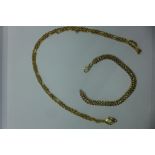 A hallmarked 9ct gold necklace, 70cm long, and a hallmarked 9ct gold bracelet 19cm long, both