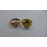 An 18ct gold signet ring, size M, approx 6.9 grams, and a 9ct gold signet ring, size M, approx 2.3