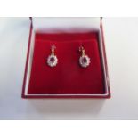 A pair of 18ct yellow and white gold ruby and diamond cluster drop earrings, size 4mm x 3.5mm,