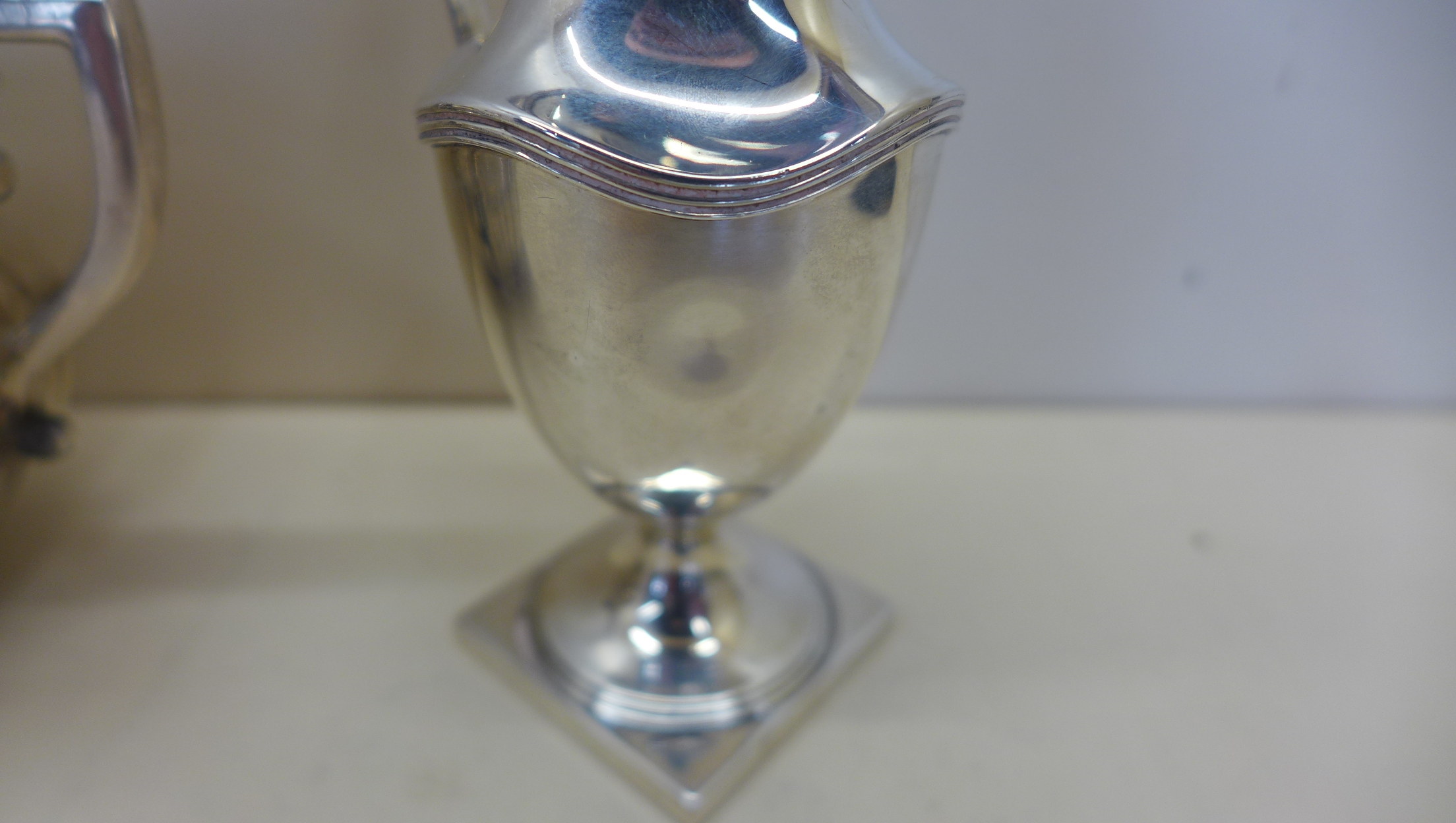 A silver twin handled sugar bowl, Birmingham 1902 - a silver cream jug Chester 1906 - and a silver - Image 2 of 5