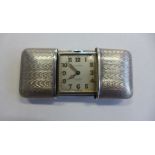 A silver 935 purse watch by Morado, in running order, generally good, 5x3.5cm closed