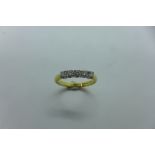 An 18ct gold hallmarked five stone diamond ring, size L, approx 3 grams, diamonds bright,