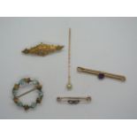 Four 9ct gold brooches and a 9ct gold and pearl stick pin, total weight approx 10.5 grams, all