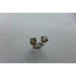 A pair of 18ct white gold diamond stud 0.75ct earrings, in good condition
