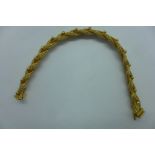 An 18ct yellow gold rope twist bracelet 19cm long closed, marked 750, approx 27.5 grams, in good