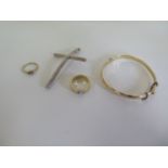 A plated bangle, a silver crucifix, a gilt metal ring and an 18ct ring, missing a stone, approx 1.