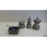 Four silver cruet pieces including a Peter Piper pepper London maker DP, the other pieces Birmingham