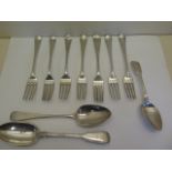 A quantity of Georgian silver flatware comprising of seven table forks, tablespoon and dessert