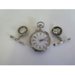 A pair of Tackhing Hong Kong silver cufflinks, and a silver pocket watch, not working