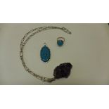 A turquoise ring and pendant and an amethyst pendant on chain, all test as silver