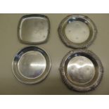 A pair of silver coasters/pin dishes - Birmingham 1973 PH VOGEI and Co, 9cm diameter and two other