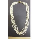 A good five string freshwater baroque pearl necklace with heavy 18ct gold clasp, clasp with