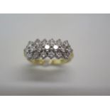 An 18ct hallmarked yellow gold nineteen stone diamond ring, approx 1.5ct - weight approx 6.1