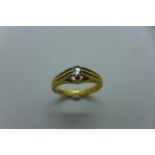 An 18ct yellow gold diamond solitaire ring, size S, approx 6.2 grams - marked 18ct, diamond