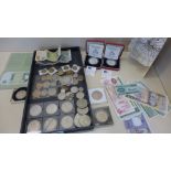 A collection of coins and bank notes to include two proof silver Crowns, 1922 silver Dollar etc