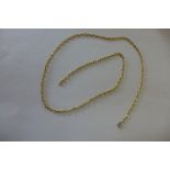 An 18ct yellow gold chain, 72cm long, approx 22.4 grams, with a base metal clasp - not hallmarked
