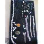 A collection of silver freshwater pearl and modern costume jewellery to include two silver/amber