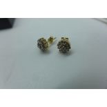 A pair of 9ct gold diamond cluster earrings, 6mm diameter approx 1 gram total weight