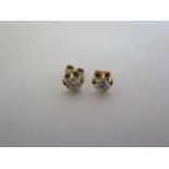 A pair of 18ct diamond studs, total estimated diamond weight approx 0.4cts, in good condition